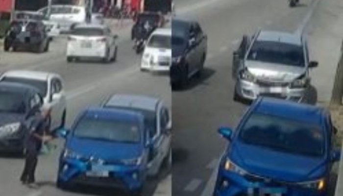 சாலையின் இரு புறங்களையும் பார்க்காமல் பாதசாரி கடந்ததால் இரு கார்கள் எதிரும் புதிருமாக மோதிக் கொண்டன.