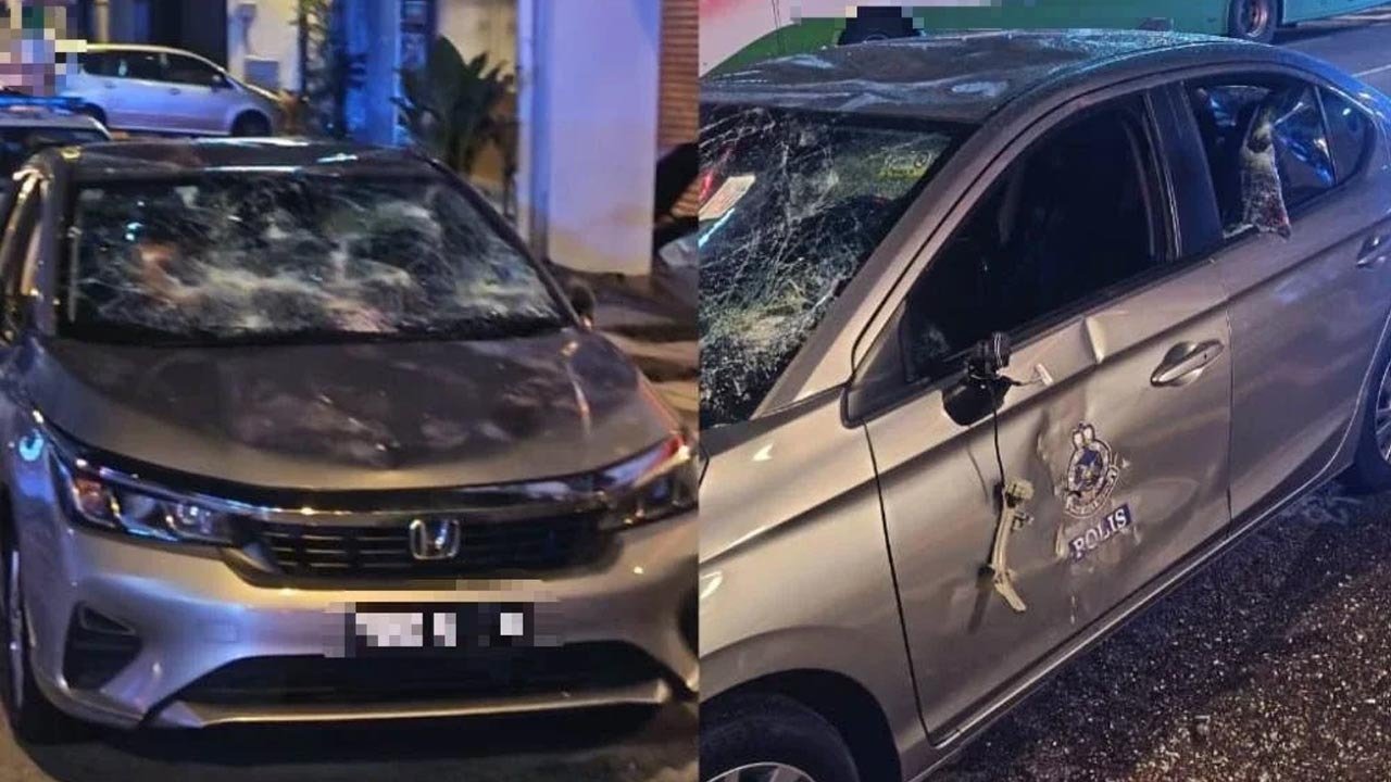 போலீஸ் கார் சேதப்படுத்திய வீடற்ற  வெளிநாட்டு நபர் கைது